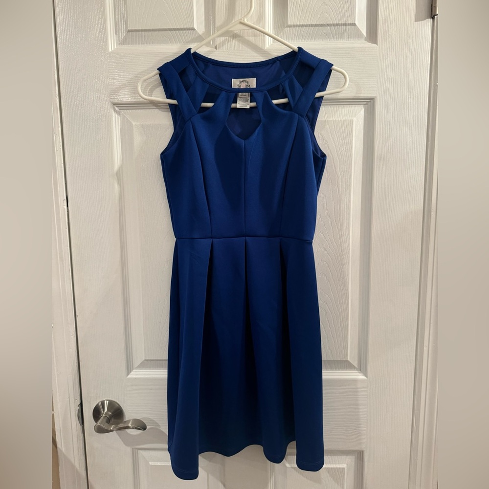 Sweet Storm blue mini dress with a cut out neckline.